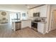Bright kitchen featuring stainless steel appliances, white cabinets, and a modern design at 884 Freestyle Ct., Longs, SC 29568