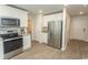 Stylish kitchen with stainless steel appliances and ample cabinet space at 884 Freestyle Ct., Longs, SC 29568