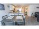 Open-concept dining area with seamless flow into the kitchen and living room at 884 Freestyle Ct., Longs, SC 29568