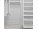 Walk-in closet with custom shelving, and ample space for clothing and storage at 100 Serenity Point Dr., Little River, SC 29566