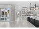 Open-concept kitchen with pendant lighting, island with marble countertop, and stainless steel appliances at 100 Serenity Point Dr., Little River, SC 29566