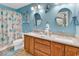 Bright bathroom with double sink vanity, decorative wall hangings, and a toilet at 1046 Palisade Circle # 1046, Myrtle Beach, SC 29577