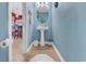View of a half bath with pedestal sink, modern mirror and paint at 1046 Palisade Circle # 1046, Myrtle Beach, SC 29577