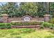 The 'Parkview' community entrance features brick pillars, lush landscaping, and a welcoming sign at 1046 Palisade Circle # 1046, Myrtle Beach, SC 29577