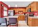 Well-equipped kitchen with stainless steel appliances, an island with seating, and ample cabinet space for storage at 1046 Palisade Circle # 1046, Myrtle Beach, SC 29577