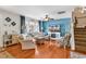 Cozy living room filled with natural light, comfortable seating, and a decorative fireplace for relaxation and enjoyment at 1046 Palisade Circle # 1046, Myrtle Beach, SC 29577