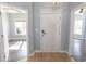 Welcoming foyer with tile flooring, neutral paint, and two entrances to bedrooms at 107 Carolines Cove Ct., Myrtle Beach, SC 29588