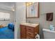 Bathroom featuring a vanity with a sink, a mirror, and a toilet, providing functionality and comfort at 1095 Plantation Dr. W # 29 N, Little River, SC 29566