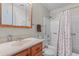 Bathroom with a tub-shower combo, vanity, and neutral tones for a clean and serene experience at 1095 Plantation Dr. W # 29 N, Little River, SC 29566