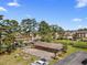 Overhead shot of a picnic and recreation area, with community buildings nearby at 1095 Plantation Dr. W # 29 N, Little River, SC 29566