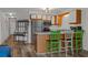 Efficient kitchen with a breakfast bar, stainless steel appliances, and ample cabinet space at 1095 Plantation Dr. W # 29 N, Little River, SC 29566