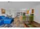 Spacious open floor plan featuring a bright living room adjacent to the kitchen and dining areas at 1095 Plantation Dr. W # 29 N, Little River, SC 29566