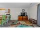 Cozy living room featuring a modern television and colorful area rug at 1095 Plantation Dr. W # 29 N, Little River, SC 29566