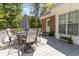 Inviting wooden back deck with a dining table, chairs, and a shade umbrella at 124 Windmeadows Dr., Conway, SC 29526