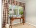 Bright desk area near the window with natural light and decorative curtains at 124 Windmeadows Dr., Conway, SC 29526