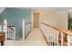 Hallway featuring carpeted floors, light-colored walls, and white railings at 124 Windmeadows Dr., Conway, SC 29526