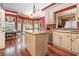 Bright kitchen with island and breakfast area, hardwood floors, stainless appliances, and granite counter tops at 124 Windmeadows Dr., Conway, SC 29526