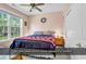 This bedroom features a large window allowing an abundance of natural light at 1249 Trent Dr., Murrells Inlet, SC 29576