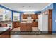 Spacious kitchen with wood cabinets, granite countertops, and modern appliances at 1249 Trent Dr., Murrells Inlet, SC 29576