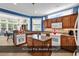 Well-equipped kitchen with double ovens, a center island, and natural light at 1249 Trent Dr., Murrells Inlet, SC 29576