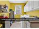 Bright laundry room with tile floors, a sink, and a washer and dryer at 1249 Trent Dr., Murrells Inlet, SC 29576