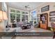Inviting living room with tile flooring and ample windows that flood the space with natural light at 1249 Trent Dr., Murrells Inlet, SC 29576