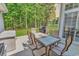 Patio area with a table and chairs, perfect for enjoying outdoor meals at 1249 Trent Dr., Murrells Inlet, SC 29576