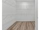 Walk-in closet with laminate floors and wire shelving provides optimal storage solutions at 135 Stonewall Circle # 7-2, Longs, SC 29568