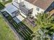 Aerial view of the backyard featuring a deck, patio, and lush greenery at 1411 Turkey Ridge Rd. # 30-B, Surfside Beach, SC 29575