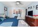 Spacious bedroom with fan, ceiling fan, wall art, and ample natural light at 1411 Turkey Ridge Rd. # 30-B, Surfside Beach, SC 29575