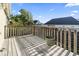Outdoor deck space with wooden railings offering a relaxing view of the backyard at 1411 Turkey Ridge Rd. # 30-B, Surfside Beach, SC 29575