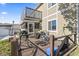 View of the outdoor deck with a grill, table, and bikes perfect for outdoor entertaining at 1411 Turkey Ridge Rd. # 30-B, Surfside Beach, SC 29575