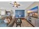 Open living area with a seamless transition to the kitchen, and modern decor and fixtures at 1512 Virginia Pine Dr., Longs, SC 29568