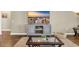 Stylish living room featuring modern furniture, and an entertainment center at 1512 Virginia Pine Dr., Longs, SC 29568