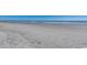 Expansive beach view with tranquil blue ocean water on a sunny day at 1625 S Ocean Blvd. # 1604, North Myrtle Beach, SC 29582