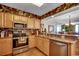 Well-equipped kitchen with stainless steel appliances, granite countertops, and ample cabinet space at 1625 S Ocean Blvd. # 1604, North Myrtle Beach, SC 29582