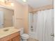 Well-lit bathroom with a shower and vanity at 1631 Low Country Pl. # E, Myrtle Beach, SC 29577