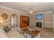 Comfortable living room with a fireplace, built-in shelving, and plush seating at 1631 Low Country Pl. # E, Myrtle Beach, SC 29577