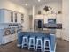 Spacious kitchen featuring a large island, stainless steel appliances, and stylish white cabinetry at 1856 Melville Ct., Little River, SC 29566