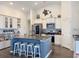 Modern kitchen with a large island, stainless steel appliances, and stylish countertops at 1856 Melville Ct., Little River, SC 29566