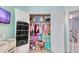 A closet filled with toys, clothes, and accessories; the closet is a walk-in with double doors at 190 Hamilton Way, Conway, SC 29526
