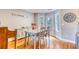 Bright dining room featuring hardwood floors, stylish furniture, and natural light at 190 Hamilton Way, Conway, SC 29526