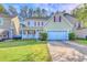 Charming two-story home with well-manicured lawn, two car garage and inviting front porch at 190 Hamilton Way, Conway, SC 29526