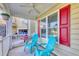 Inviting covered front porch with cozy seating, shutters, and space for relaxing at 190 Hamilton Way, Conway, SC 29526