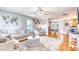 Open-concept living area with hardwood floors, ample seating, and access to dining room at 190 Hamilton Way, Conway, SC 29526