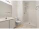 Bathroom features a shower-tub combo, toilet, sink with vanity, and a mirror at 2000 Cross Gate Blvd. # 104, Surfside Beach, SC 29575