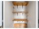 Closet features simple wooden shelving at 2000 Cross Gate Blvd. # 104, Surfside Beach, SC 29575
