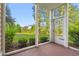 Screened in patio featuring tiled floors and a backyard view at 2000 Cross Gate Blvd. # 104, Surfside Beach, SC 29575