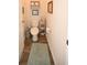 Efficient half-bathroom with neutral finishes and streamlined fixtures at 203 Golden Bear Circle, Longs, SC 29568