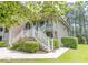 Beautiful condo with a welcoming front porch and well-maintained landscaping at 227 Pinehurst Ln. # 6D, Pawleys Island, SC 29585